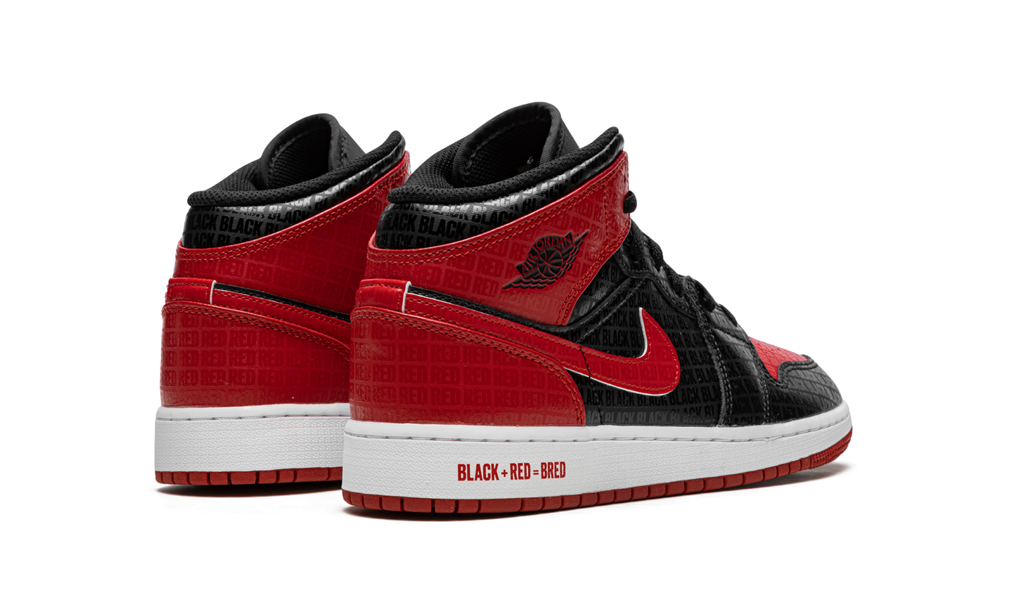 Air Jordan 1 Mid Bred Text